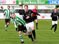 HL20180317008  17-03-2018: Voetbal: SC Genemuiden v DFS: Genemuiden/Sijmon Eenkhoorn (l) of Genemuiden, Mart Raterink (r) of DFS/ : SC Genemuiden, DFS, Zaterdagamateurvoetbal, Hoofdklasse B, Sijmon Eenkhoorn, Mart Raterink