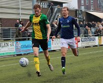 HL20260130008 HUIZEN, NETHERLANDS - JANUARY 31, 2026: Tim Vrakking (l) of Huizen, Niels Grevink (r) of Genemuiden. Competition match between SV Huizen vs SC Genemuiden at...