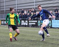 HL20260130021 HUIZEN, NETHERLANDS - JANUARY 31, 2026: Artuur Zutterman (l) of Huizen, Rutger Etten (r) of Genemuiden. Competition match between SV Huizen vs SC Genemuiden at...