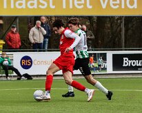 HL20260321009 GENEMUIDEN, NETHERLANDS - MARCH 21: Amin Moumouh (l) of Hercules, Jasper Tuinman (r) of Genemuiden. Competition match between SC Genemuiden vs USV Hercules at...