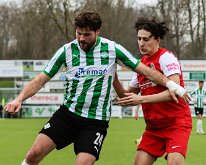 HL20260321017 GENEMUIDEN, NETHERLANDS - MARCH 21: Berwout Beiemers (l) of Genemuiden, Amin Moumouh (r) of Hercules. Competition match between SC Genemuiden vs USV Hercules at...