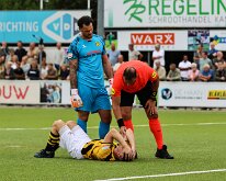 HL20260815011 GENEMUIDEN, NETHERLANDS - AUGUST 2026: Jan van Willige (l) of DVS, Ref. F.E. ter Brake. Competition match between SC Genemuiden vs DVS '33 at Sports complex...